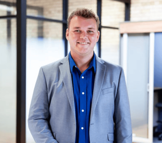 Portrait of Alex Lamberts, Realtor.
